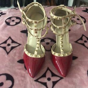 Studded red shoes